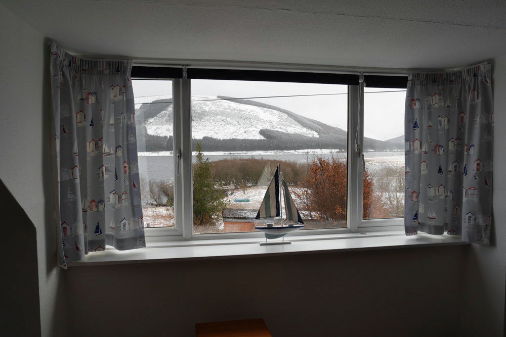 view of upstairs bedroom window with view of St Mary's Loch